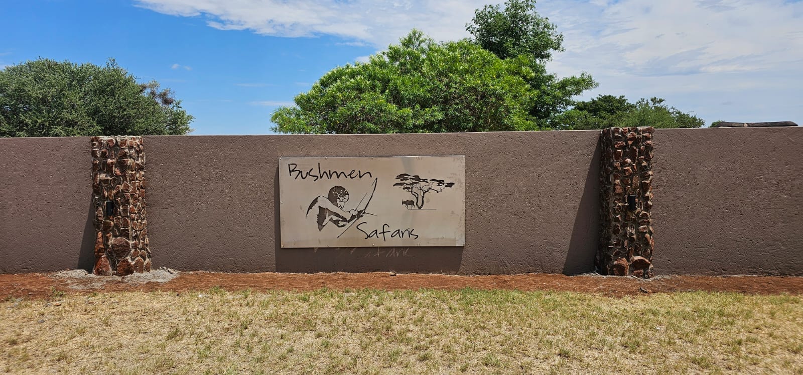 Business backlit sign — bushmensafaris example — MoreThanDecor